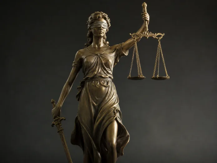 Estatua de la justicia con balanza, símbolo de la tramitación de una posesión efectiva